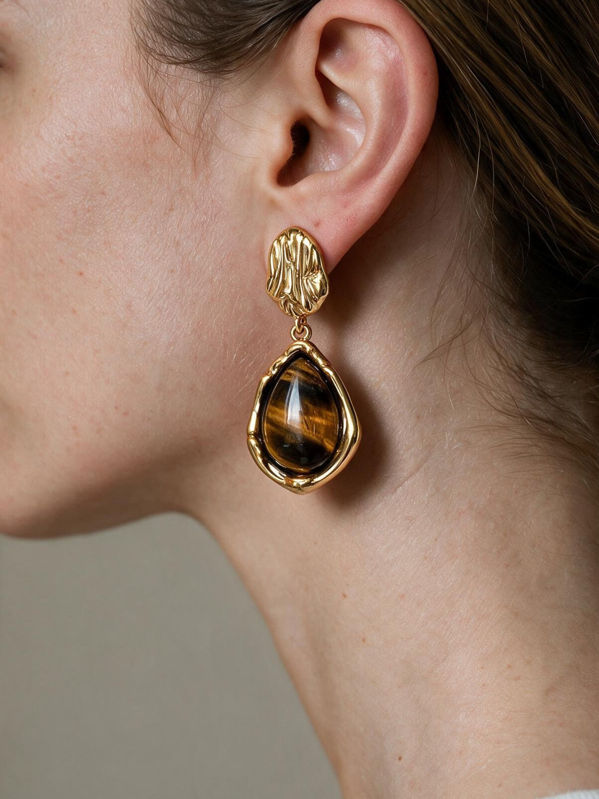 Aretes de broquel o de gota, segunda vista