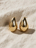 Aretes en forma de gota, color dorado, vista frontal
