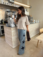 Blusa de lino con dobladillo deshilachado, color beige, vista lateral