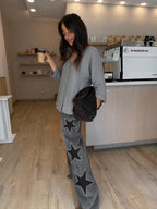 Blusa fluida con botonadura completa, color gris, vista frontal