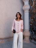 Cárdigan de tejido acolchado con patrón de rombos, color rosa, vista frontal