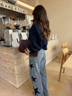 Jeans con estrellas bordadas, segunda vista