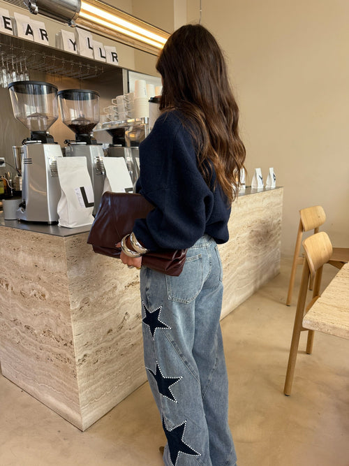 Jeans con estrellas bordadas, segunda vista