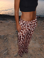 Pantalón fluido con animal print, séptima vista