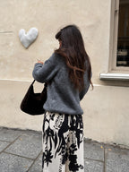 Pantalón palazzo con estampado botánico, color blanco, vista trasera