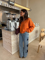Suéter casual con escote en V, color naranja, vista frontal
