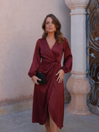 Vestido midi con mangas globo y cintura marcada, vista frontal